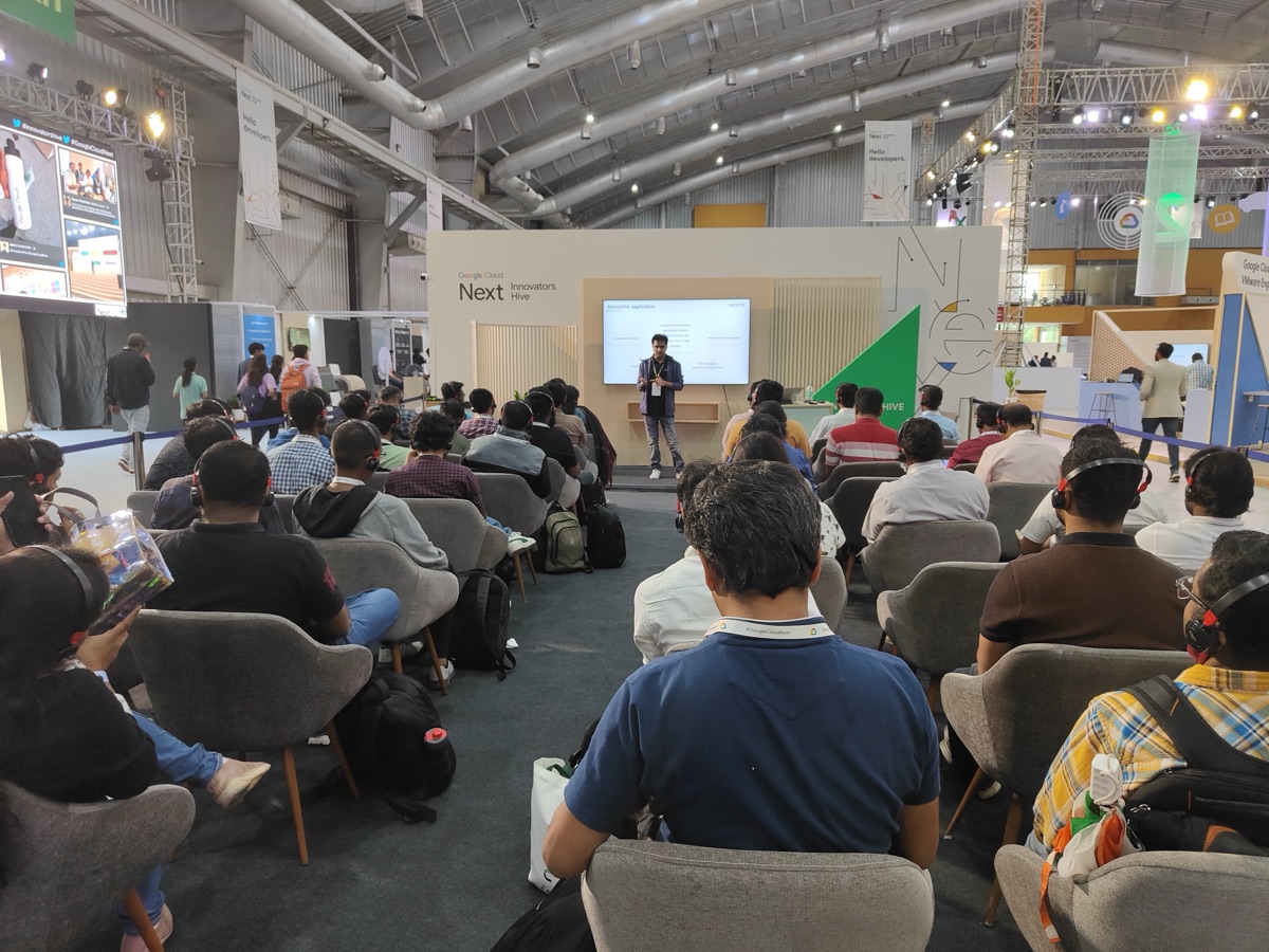 Presenting on the Innovators Hive stage — full audience view